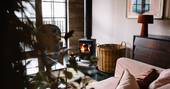 The Artist's House cottage living room with wood burner, Wilkieston, Edinburgh, Scotland