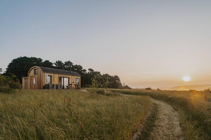 Cabin at sunset with countryside views 