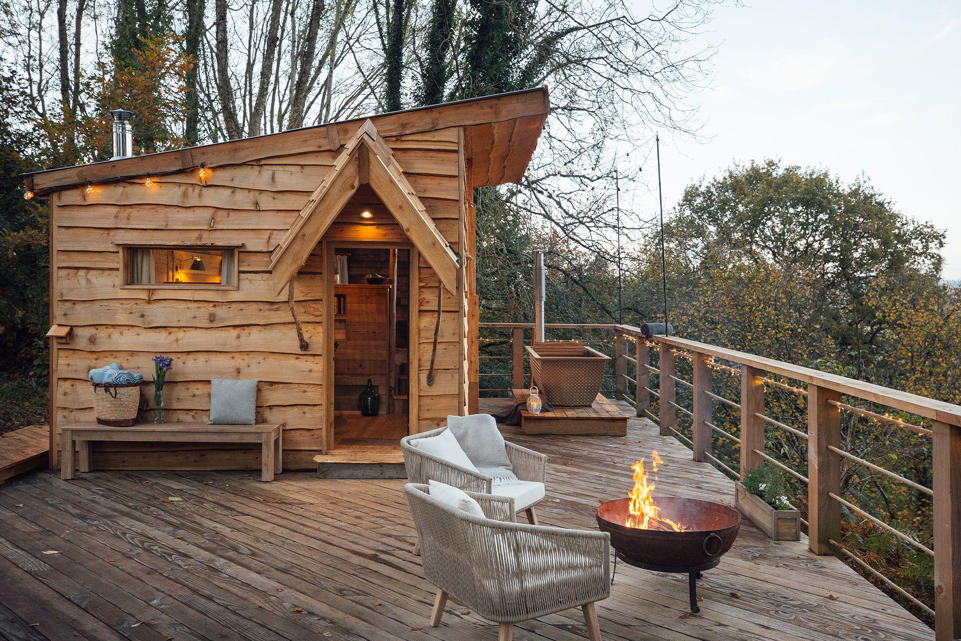 Hot tub on the deck of a treehouse