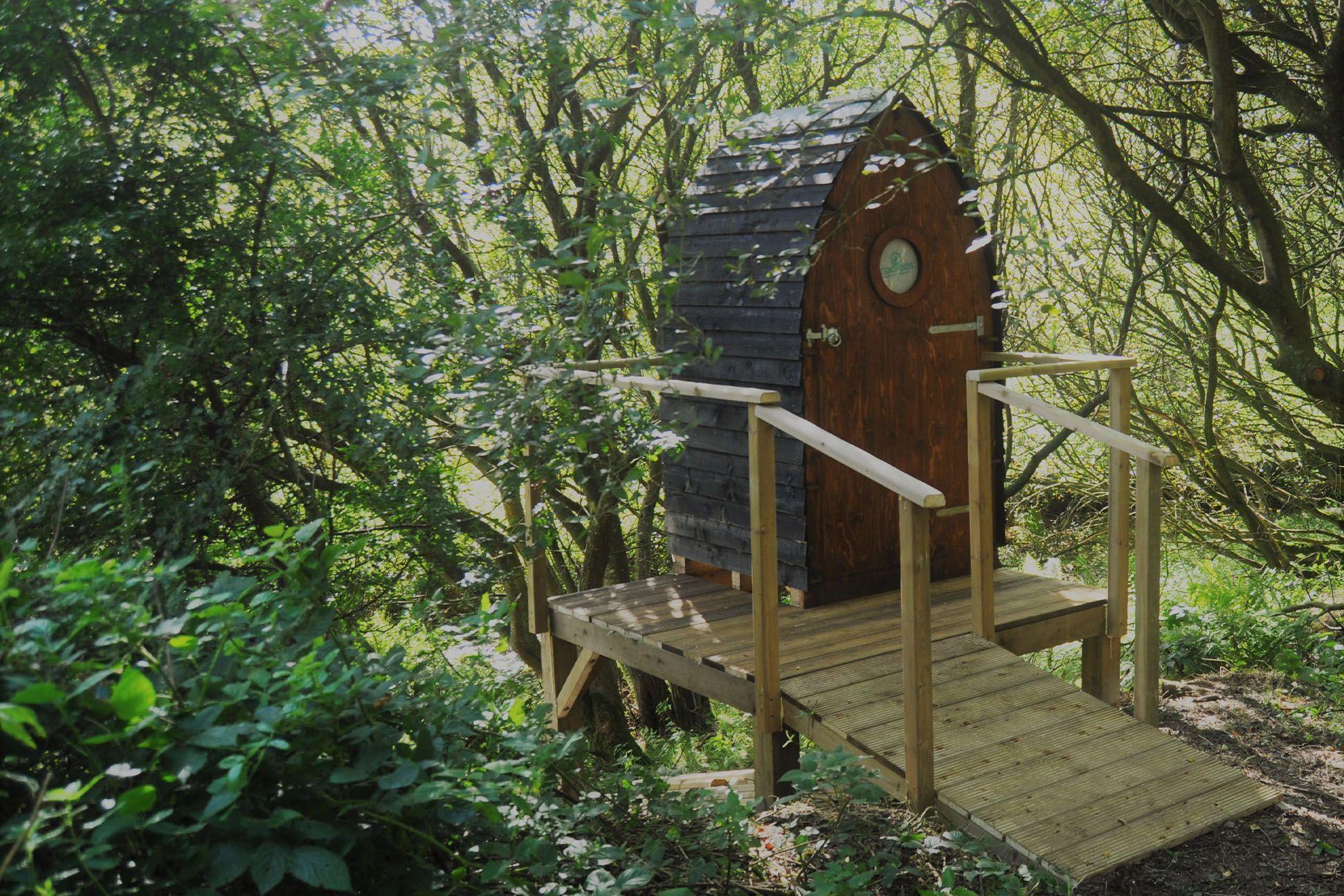 Outdoor toilet in the woods