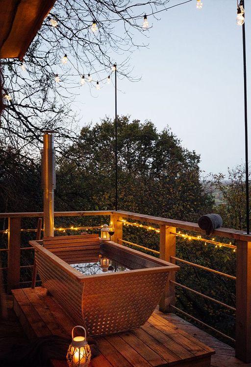 Hot tub lit up by fairy lights