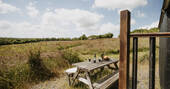 View from picnic bench outside hut