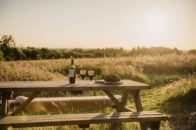 Picnic bench outside of hut