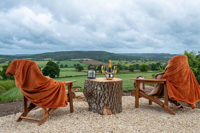 Chairs and hilly views