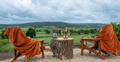 Chairs and hilly views