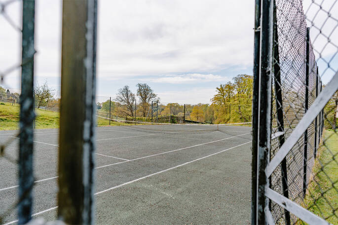 Tennis court at The Buzzardry