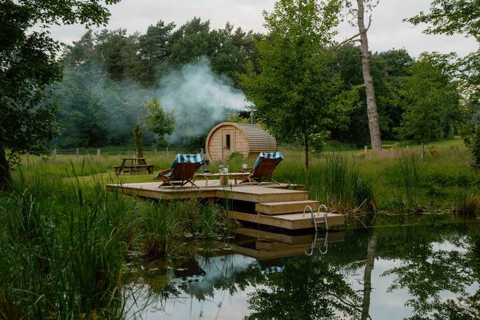 Sauna next to the swimming pond