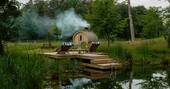 Sauna next to the swimming pond