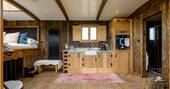 Open-plan kitchen with an oven, kettle, toaster and gas hob